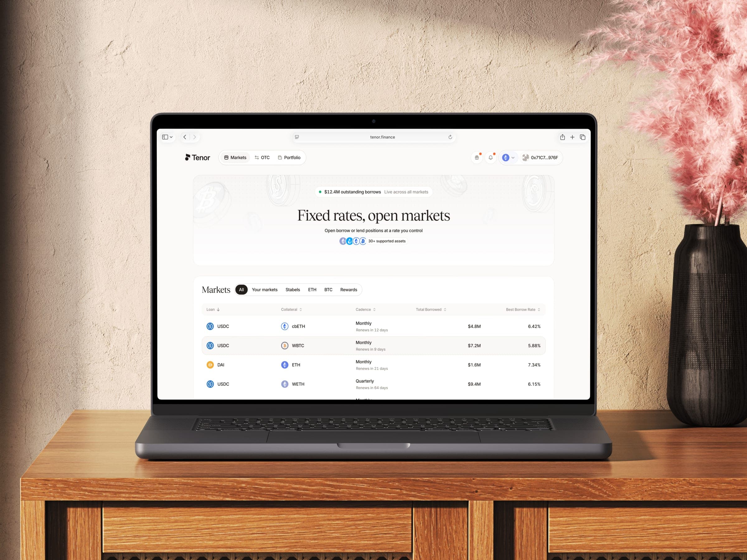 Tenor markets page on a laptop, listing fixed rates and terms for several assets